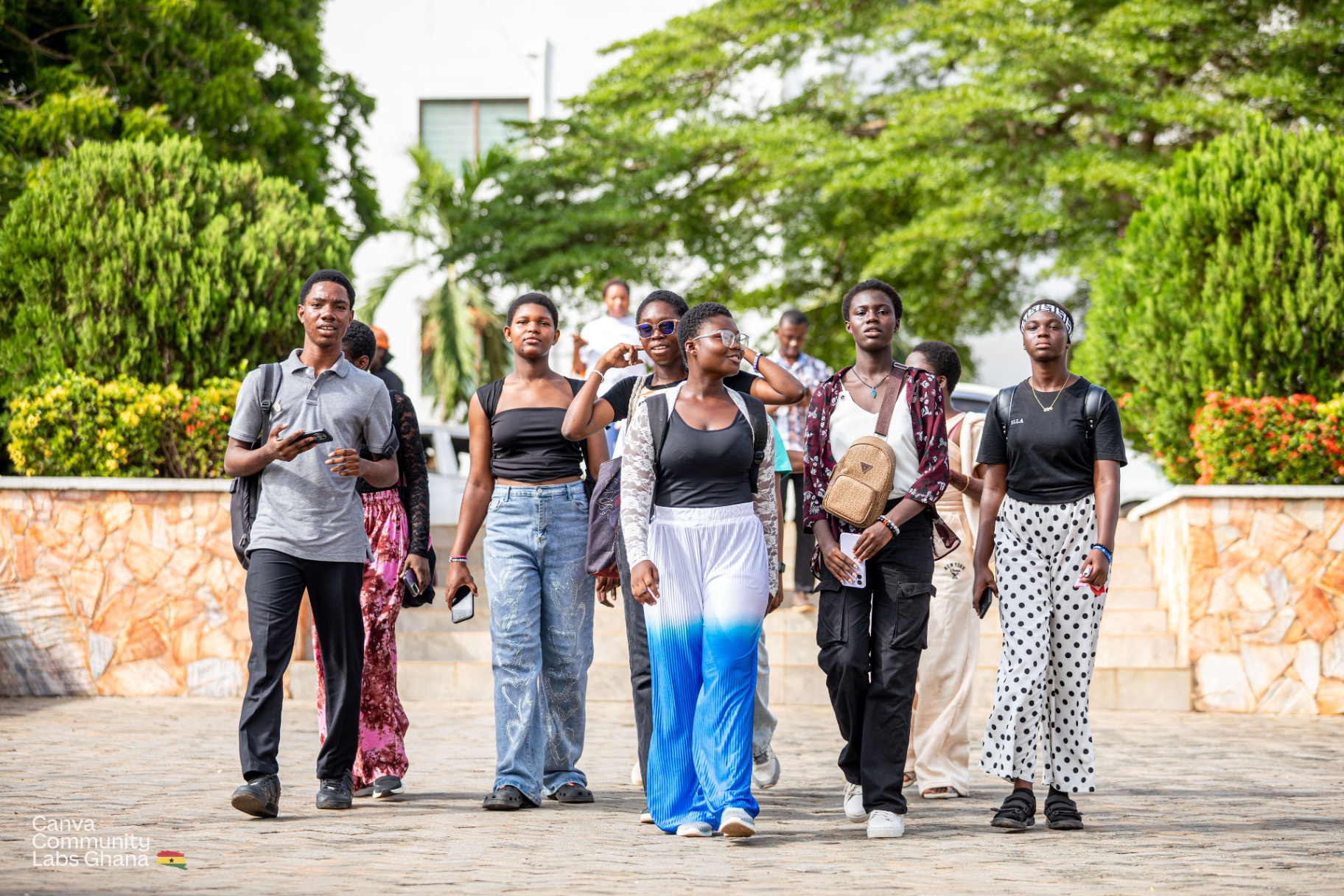 Students arriving at a creative workshop venue