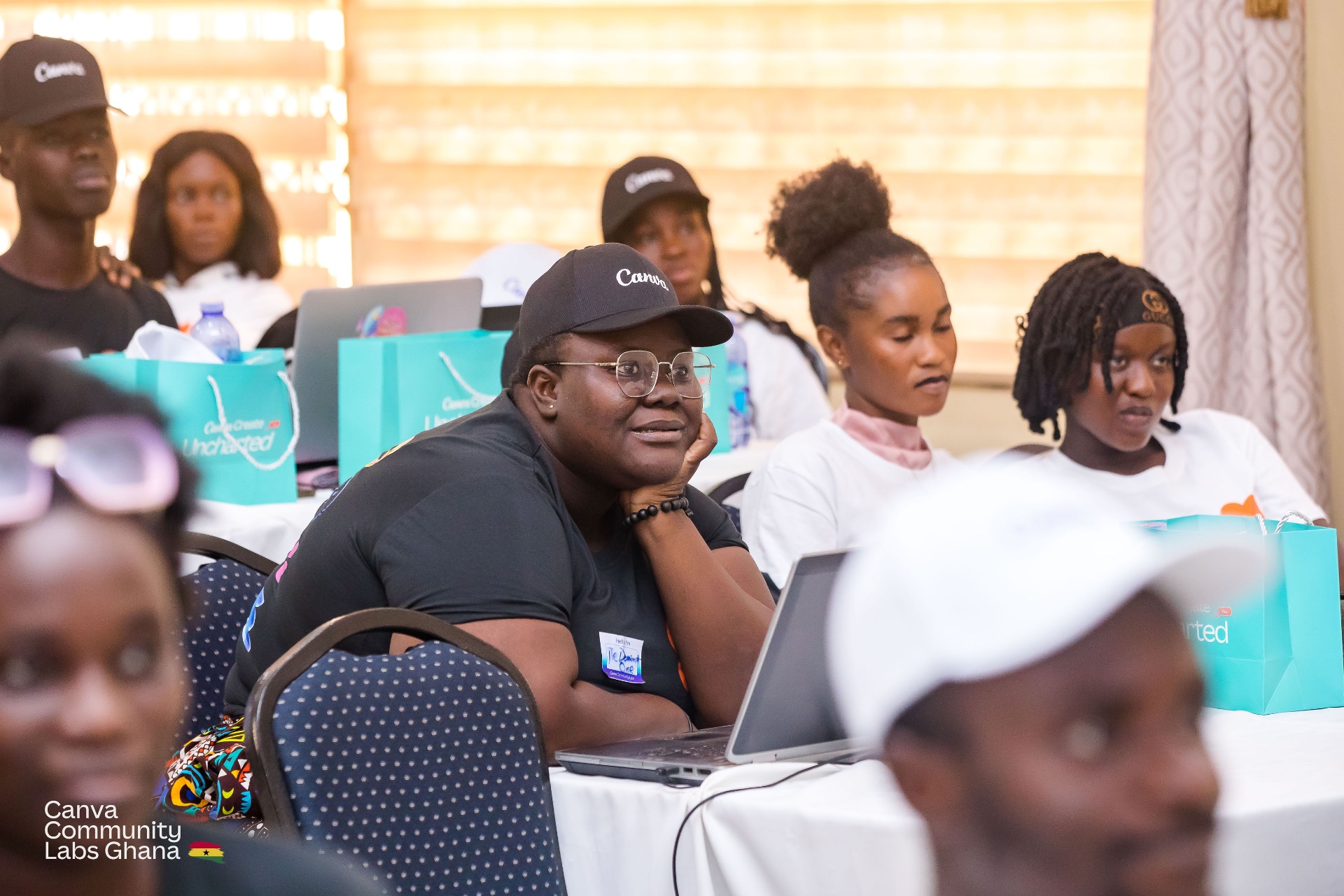 Focused participant listening in during a creative session